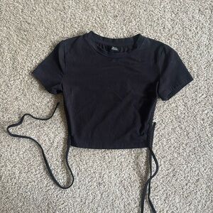 Short sleeve, open back black crop with wrap around tie, size XS